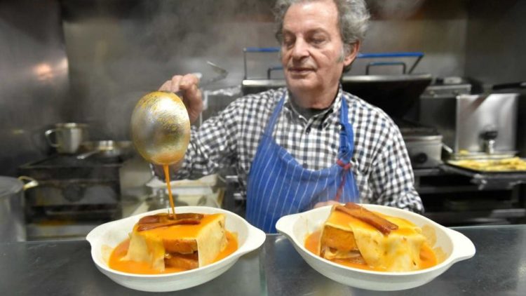 Ordering Francesinha at Bufete Fase in Porto